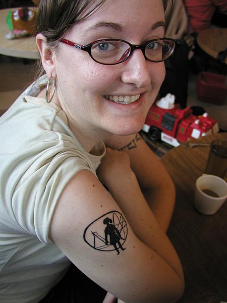 April and her new Devo Duty Now for the Future tattoo